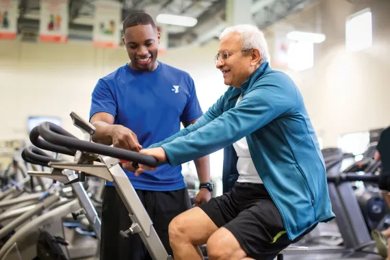 active older adult exercising on a cycle