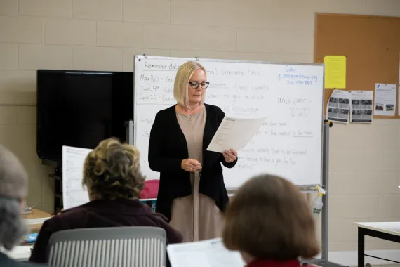 Woman teaching in classroom