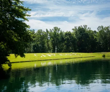 Camp Hanes lake and cross