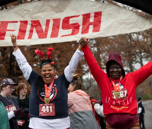 Women celebrating at finish line